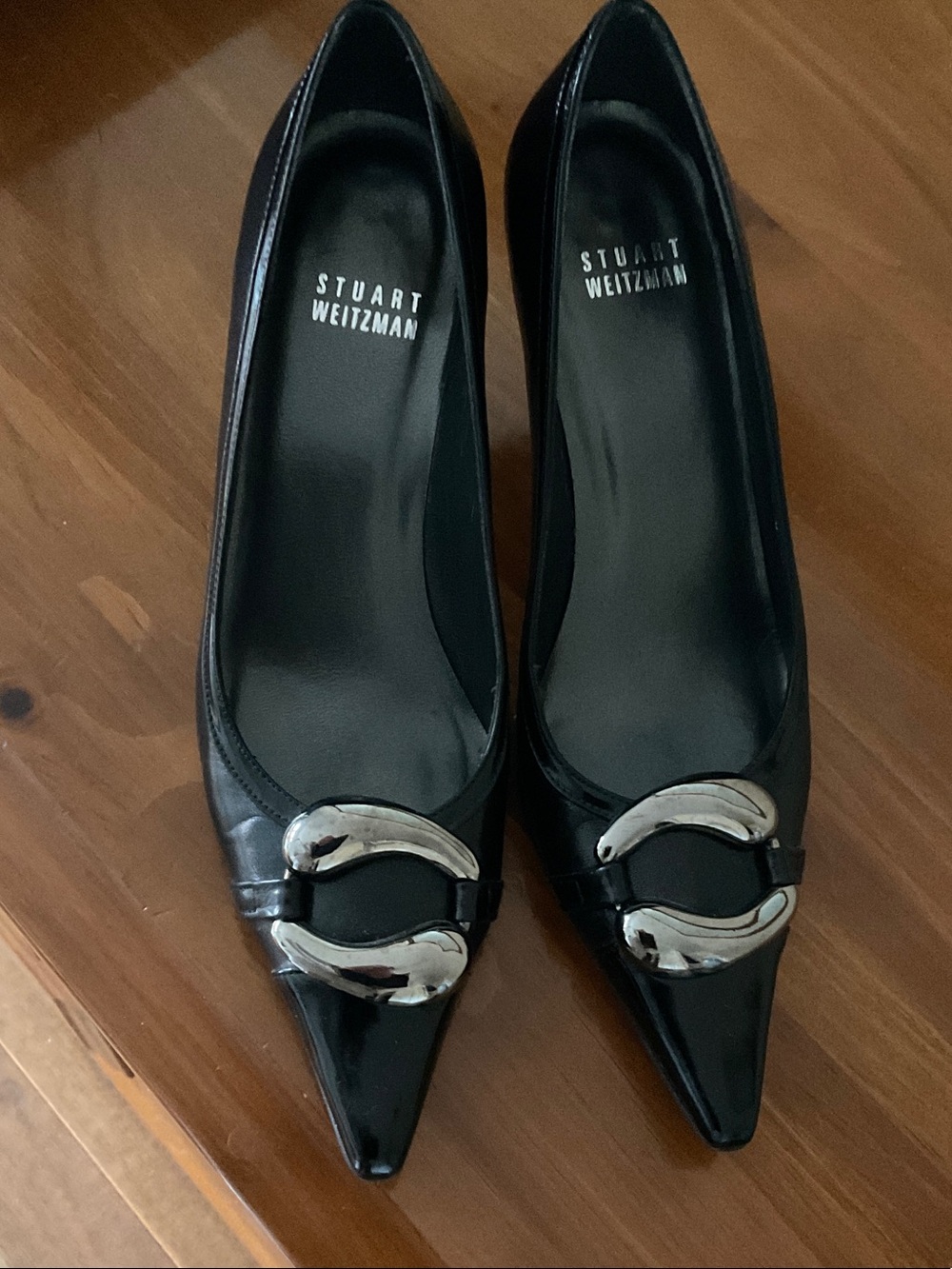 Stuart Weitzman Black Pointed Leather Pumps with Silver Buckle